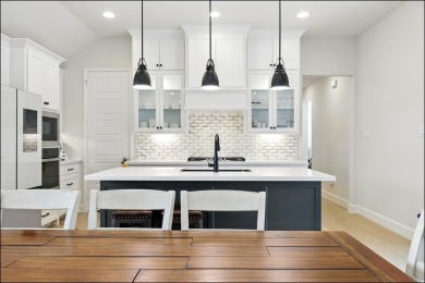 Discover the epitome of lakeside living in this stunning Perry on The Tribute At the Colony in Texas - for sale on GolfHomes.com, golf home, golf lot