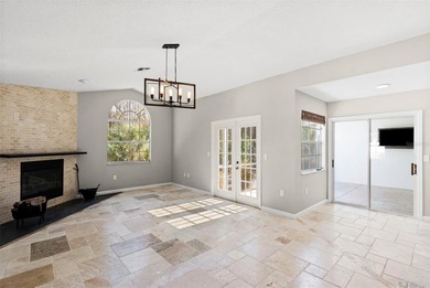 Welcome to 1675 Polo Club Dr, a home that makes it easy to slow on Tarpon Springs Golf Course in Florida - for sale on GolfHomes.com, golf home, golf lot