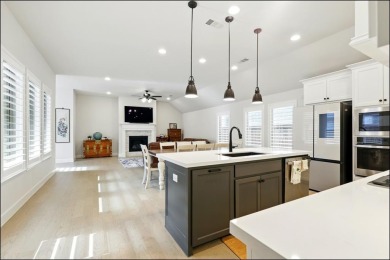 Discover the epitome of lakeside living in this stunning Perry on The Tribute At the Colony in Texas - for sale on GolfHomes.com, golf home, golf lot