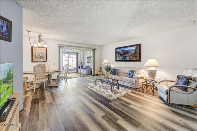 Ideally located in the center of the vibrant 55+ community of on Stardust Golf Course in Arizona - for sale on GolfHomes.com, golf home, golf lot