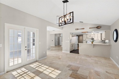 Welcome to 1675 Polo Club Dr, a home that makes it easy to slow on Tarpon Springs Golf Course in Florida - for sale on GolfHomes.com, golf home, golf lot