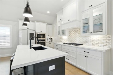 Discover the epitome of lakeside living in this stunning Perry on The Tribute At the Colony in Texas - for sale on GolfHomes.com, golf home, golf lot