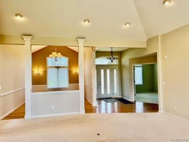 Greetings from this beautiful home at Woodridge Farms, adjacent on Copper Ridge Golf Club in Michigan - for sale on GolfHomes.com, golf home, golf lot
