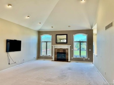 Greetings from this beautiful home at Woodridge Farms, adjacent on Copper Ridge Golf Club in Michigan - for sale on GolfHomes.com, golf home, golf lot