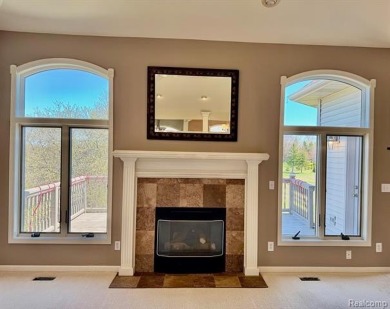 Greetings from this beautiful home at Woodridge Farms, adjacent on Copper Ridge Golf Club in Michigan - for sale on GolfHomes.com, golf home, golf lot
