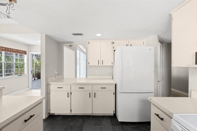 Welcome to 1675 Polo Club Dr, a home that makes it easy to slow on Tarpon Springs Golf Course in Florida - for sale on GolfHomes.com, golf home, golf lot