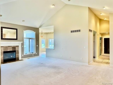 Greetings from this beautiful home at Woodridge Farms, adjacent on Copper Ridge Golf Club in Michigan - for sale on GolfHomes.com, golf home, golf lot