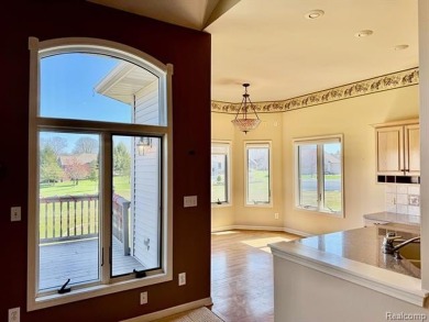 Greetings from this beautiful home at Woodridge Farms, adjacent on Copper Ridge Golf Club in Michigan - for sale on GolfHomes.com, golf home, golf lot