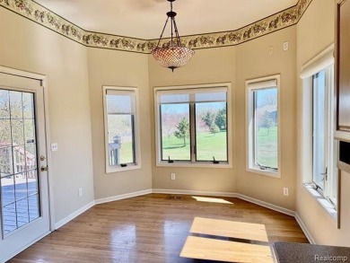 Greetings from this beautiful home at Woodridge Farms, adjacent on Copper Ridge Golf Club in Michigan - for sale on GolfHomes.com, golf home, golf lot