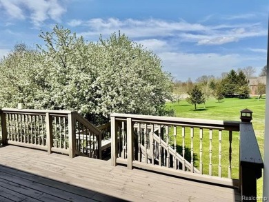 Greetings from this beautiful home at Woodridge Farms, adjacent on Copper Ridge Golf Club in Michigan - for sale on GolfHomes.com, golf home, golf lot