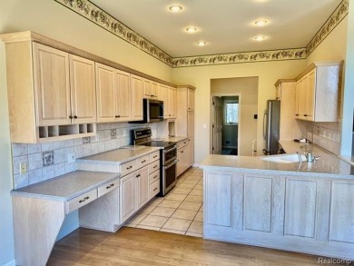 Greetings from this beautiful home at Woodridge Farms, adjacent on Copper Ridge Golf Club in Michigan - for sale on GolfHomes.com, golf home, golf lot