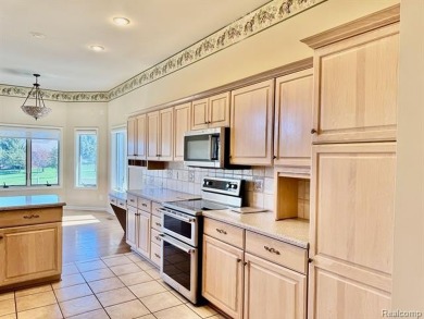 Greetings from this beautiful home at Woodridge Farms, adjacent on Copper Ridge Golf Club in Michigan - for sale on GolfHomes.com, golf home, golf lot