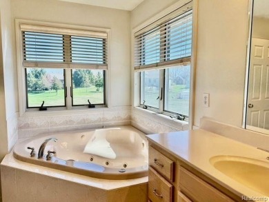 Greetings from this beautiful home at Woodridge Farms, adjacent on Copper Ridge Golf Club in Michigan - for sale on GolfHomes.com, golf home, golf lot