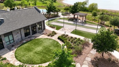 Discover the epitome of lakeside living in this stunning Perry on The Tribute At the Colony in Texas - for sale on GolfHomes.com, golf home, golf lot