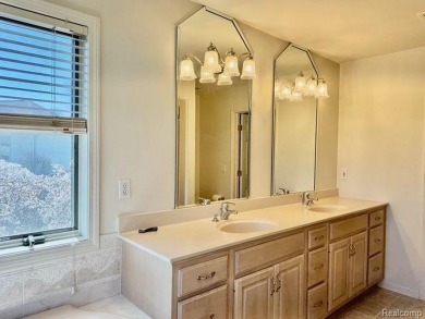 Greetings from this beautiful home at Woodridge Farms, adjacent on Copper Ridge Golf Club in Michigan - for sale on GolfHomes.com, golf home, golf lot