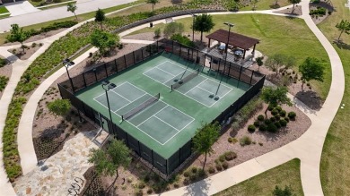 Discover the epitome of lakeside living in this stunning Perry on The Tribute At the Colony in Texas - for sale on GolfHomes.com, golf home, golf lot
