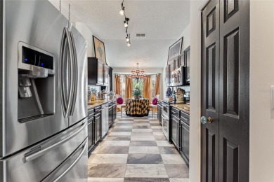 METICULOUSLY MAINTAINED, CHARACTER AND CHARM! Highly sought on Caloosa Greens Executive Golf Course in Florida - for sale on GolfHomes.com, golf home, golf lot