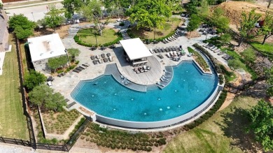 Discover the epitome of lakeside living in this stunning Perry on The Tribute At the Colony in Texas - for sale on GolfHomes.com, golf home, golf lot