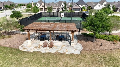 Discover the epitome of lakeside living in this stunning Perry on The Tribute At the Colony in Texas - for sale on GolfHomes.com, golf home, golf lot