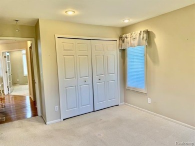 Greetings from this beautiful home at Woodridge Farms, adjacent on Copper Ridge Golf Club in Michigan - for sale on GolfHomes.com, golf home, golf lot