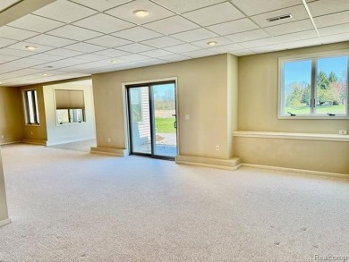 Greetings from this beautiful home at Woodridge Farms, adjacent on Copper Ridge Golf Club in Michigan - for sale on GolfHomes.com, golf home, golf lot