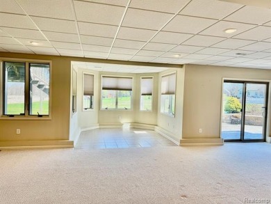 Greetings from this beautiful home at Woodridge Farms, adjacent on Copper Ridge Golf Club in Michigan - for sale on GolfHomes.com, golf home, golf lot
