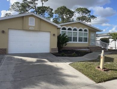 The Lot Rent for this home is $1,342.00/monthly.  This Del Tura on Del Tura Golf and Country Club in Florida - for sale on GolfHomes.com, golf home, golf lot