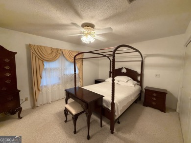 Check out this amazing brick home located near Forest Heights on Forest Heights Country Club in Georgia - for sale on GolfHomes.com, golf home, golf lot