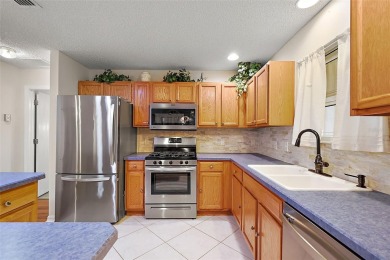 FANTASTIC TURNKEY 3/2 Amarillo with SPACIOUS UNDER-AIR BONUS on The Links of Spruce Creek in Florida - for sale on GolfHomes.com, golf home, golf lot