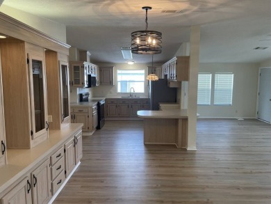 The Lot Rent for this home is $1,342.00/monthly.  This Del Tura on Del Tura Golf and Country Club in Florida - for sale on GolfHomes.com, golf home, golf lot