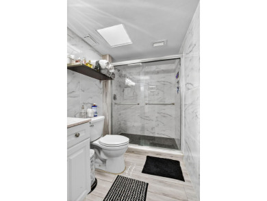 This Updated 55+,1300 SQFT. 2/2 Condo with updated kitchen on Boca Dunes Golf and Country Club in Florida - for sale on GolfHomes.com, golf home, golf lot