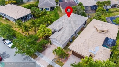 Welcome to this stunning three-bedroom, two-and-a-half-bathroom on Heron Bay Golf Club in Florida - for sale on GolfHomes.com, golf home, golf lot