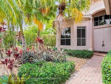 Welcome to this stunning three-bedroom, two-and-a-half-bathroom on Heron Bay Golf Club in Florida - for sale on GolfHomes.com, golf home, golf lot
