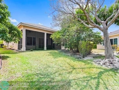 Welcome to this stunning three-bedroom, two-and-a-half-bathroom on Heron Bay Golf Club in Florida - for sale on GolfHomes.com, golf home, golf lot