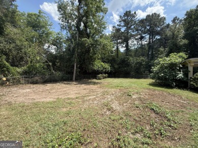 Check out this amazing brick home located near Forest Heights on Forest Heights Country Club in Georgia - for sale on GolfHomes.com, golf home, golf lot
