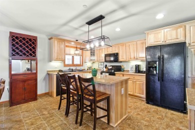 Pride of ownership is evident in this meticulously maintained on Northern Bay Golf Resort and Marina in Wisconsin - for sale on GolfHomes.com, golf home, golf lot