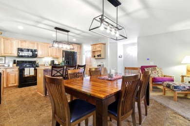 Pride of ownership is evident in this meticulously maintained on Northern Bay Golf Resort and Marina in Wisconsin - for sale on GolfHomes.com, golf home, golf lot