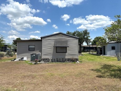 2-BEDROOM, 2-BATHROOM HOME IN GOLF COMMUNITY, ANGLERS GREEN on Anglers Green Golf Course in Florida - for sale on GolfHomes.com, golf home, golf lot