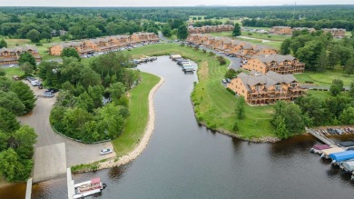 BOAT SLIP FOR 2025! Beautiful second floor condo with on Northern Bay Golf Resort and Marina in Wisconsin - for sale on GolfHomes.com, golf home, golf lot