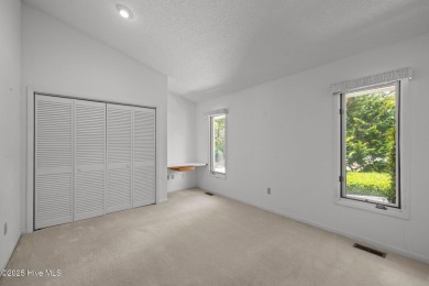 Welcome to this charming and light-filled contemporary-style on Brandywine Bay Golf Club in North Carolina - for sale on GolfHomes.com, golf home, golf lot
