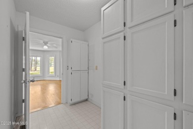 Welcome to this charming and light-filled contemporary-style on Brandywine Bay Golf Club in North Carolina - for sale on GolfHomes.com, golf home, golf lot