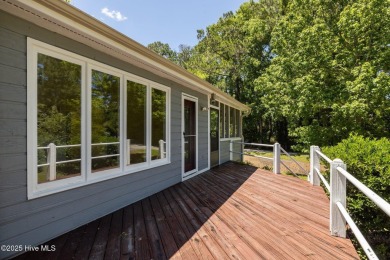 Welcome to this charming and light-filled contemporary-style on Brandywine Bay Golf Club in North Carolina - for sale on GolfHomes.com, golf home, golf lot