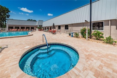 Under contract-accepting backup offers. This 55+ maintenance on Summertree Golf Course in Florida - for sale on GolfHomes.com, golf home, golf lot