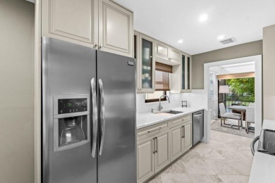 Boca West Beauty. This stunning 1,680 sq. ft 3/2.5 in Willow on Boca West Golf and Country Club in Florida - for sale on GolfHomes.com, golf home, golf lot