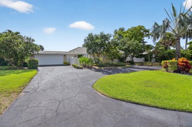 Welcome to 11814 N Lake in prestigious Delray Dunes Golf and on Delray Dunes Golf and Country Club in Florida - for sale on GolfHomes.com, golf home, golf lot