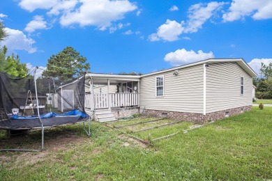 Beautiful 3 bedroom, 2 bath home centrally located in Myrtle on Whispering Pines in South Carolina - for sale on GolfHomes.com, golf home, golf lot
