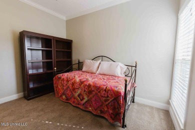 Welcome to this charming 3-bedroom, 2-bath home in the highly on Lake Caroline Golf Club in Mississippi - for sale on GolfHomes.com, golf home, golf lot