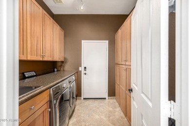 Spectacular single-level home with panoramic city light & on Sanctuary Golf Course At WestWorld in Arizona - for sale on GolfHomes.com, golf home, golf lot