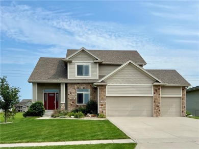 Beautiful five-bedroom, four-bathroom, two-story residence on Otter Creek Golf Course in Iowa - for sale on GolfHomes.com, golf home, golf lot