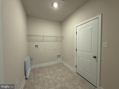 READY NOW-PHOTOS OF ACTUAL HOME!  This Laguna villa-style home on Plantation Lakes Golf and Country Club in Delaware - for sale on GolfHomes.com, golf home, golf lot